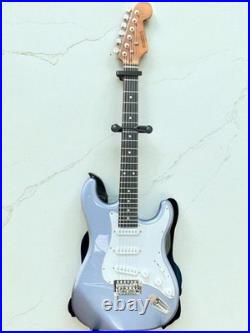 Busker Electric Guitar with Stand, Tuner, Picks, Strings, Book, and Accessories