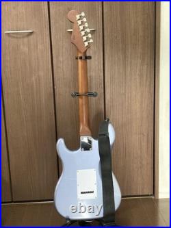 Busker Electric Guitar with Stand, Tuner, Picks, Strings, Book, and Accessories