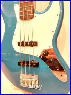 Busker's Electric Jazz Bass Turquoise Blue Guitar with Soft Case