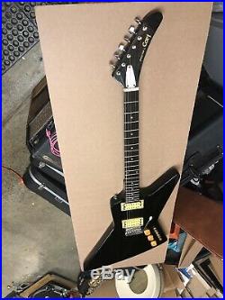 Cort 159-14912 Black Effector 80s Electric Guitar Explorer Style onboard Effects