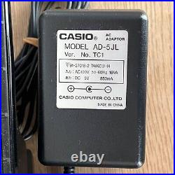 DG-1 CASIO Digital Midi Guitar Synthesizer with power supply strap