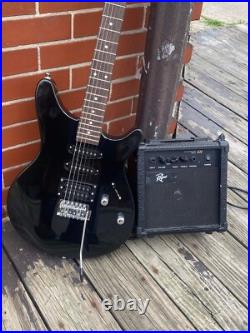 Electric guitar with amp used