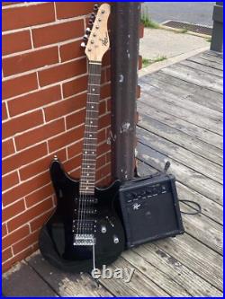 Electric guitar with amp used