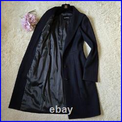 Max Mara long coat, size 40 Wool black. Woman Stand Collar