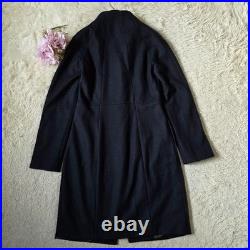 Max Mara long coat, size 40 Wool black. Woman Stand Collar