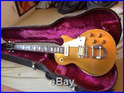 Older Gold Gibson Les Paul Model Electric Guitar With Hardshell Case