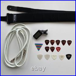 Pick shield strap tuner