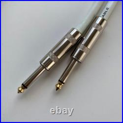 Pick shield strap tuner